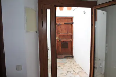 an open door to a room with a door at Old Navy House in Badalona