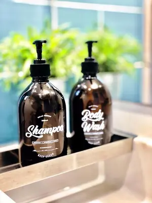 two bottles of soap sitting in a drawer at Casa Tortilla Sagrada Familia in Barcelona