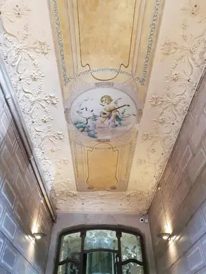 a room with a ceiling with a painting on it at Beautiful & Luxury Apartment centrally-located in Barcelona