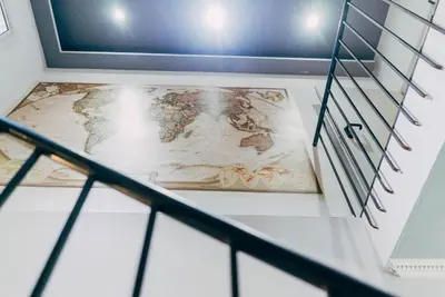 a map of the world on a wall at Black Swan Hostel Barcelona in Barcelona