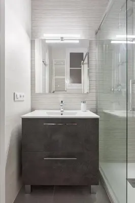 a bathroom with a sink and a shower at Art House Cathedral Sagrada Familia in Barcelona