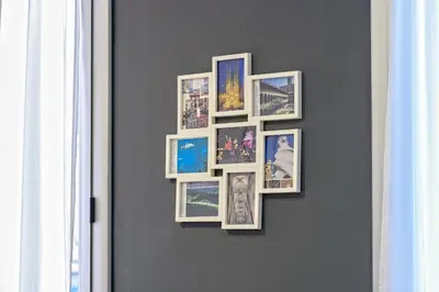a group of pictures hanging on a wall at Loft en Badalona Centro in Badalona