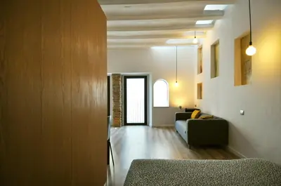 a living room with a couch and a table at Apartamento en Vilanova in Vilanova i la Geltrú