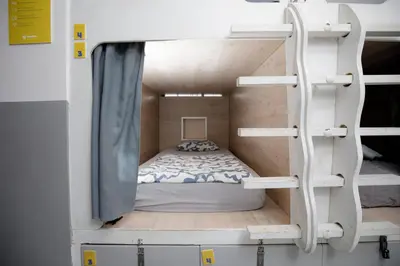 a bedroom with a bunk bed in a room at Onefam Ramblas in Barcelona