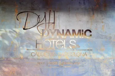 a sign that says dynamamine hotels on a wall at Dynamic Hotels Caldetes Barcelona in Caldes d'Estrac