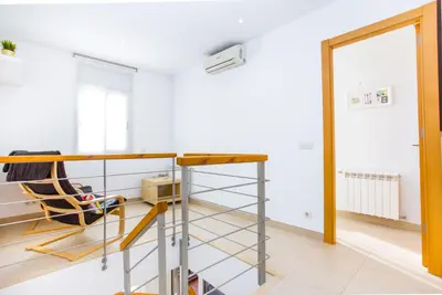 a room with a desk and a chair at Feriapiso Apartments Palmer in Hospitalet de Llobregat