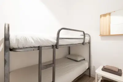 a kitchen with a sink and a counter top at Sagrada Familia Comfy apartment in Barcelona