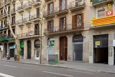 a building on the side of a city street at Casa Cosi - Mallorca 2 in Barcelona