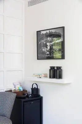 a black and white picture of a ferris wheel on a wall at Yurbban Ramblas Boutique Hotel in Barcelona