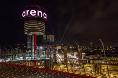 a night view of a city with a water tower at Apartamento Noemi in Barcelona