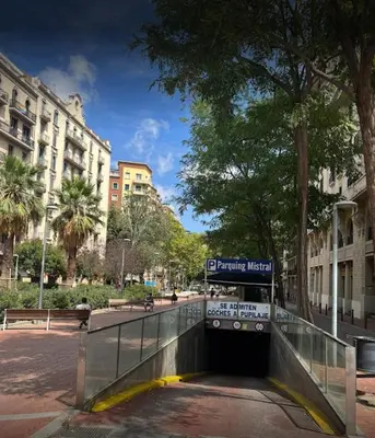 a bus is going through a tunnel in a city at Apartamento Noemi in Barcelona