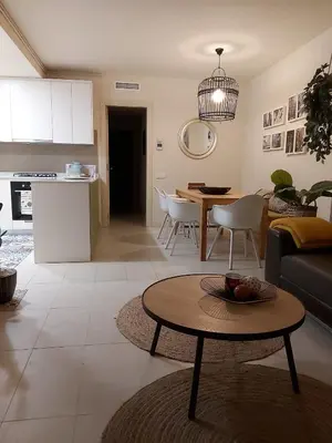 a bathroom with two sinks and a large mirror at Casa Susana in Sitges