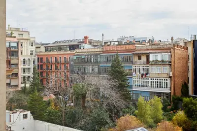 a group of buildings in a city at SUN RAMBLA CATALUNYA GAUDI (Limpieza Desinfección) in Barcelona