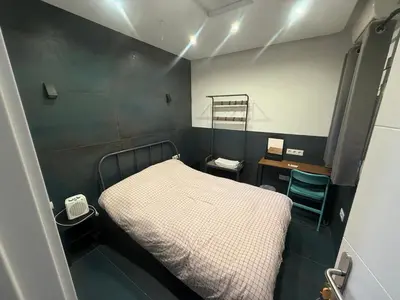 a small room with a bed and a desk at Practical room: Barcelona-Fira-Airport in Hospitalet de Llobregat