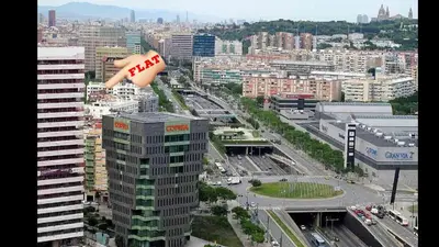 a tall building with a chili dog on top of it at Practical room: Barcelona-Fira-Airport in Hospitalet de Llobregat