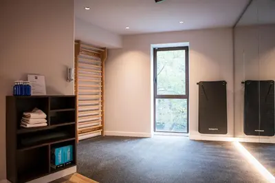 a room with a closet and a large window at MH Apartments Urban in Barcelona