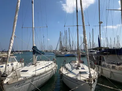 a group of boats docked in a harbor at Beach Apartment in Vilanova i la Geltrú