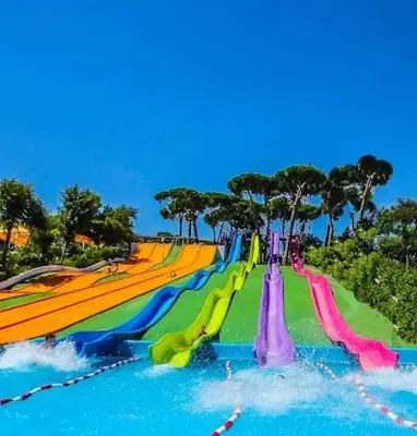 a large water park with a rainbow slide at Elsi's place in Premiá de Mar