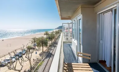 a balcony with a view of the beach at HomeHolidaysRentals Etoile in Calella