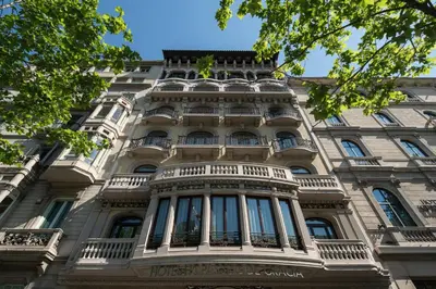 a tall building with balconies on the front of it at Catalonia Passeig de Gràcia 4* Sup in Barcelona