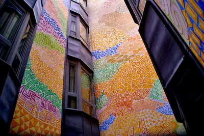 a colorful mural on the side of a building at Catalonia Passeig de Gràcia 4* Sup in Barcelona