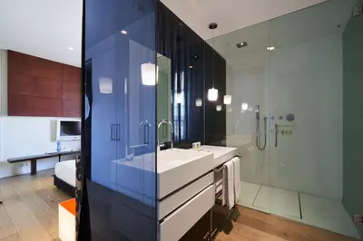 a bathroom with a sink and a shower at Mercer Casa Torner i Güell in Vilafranca del Penedès