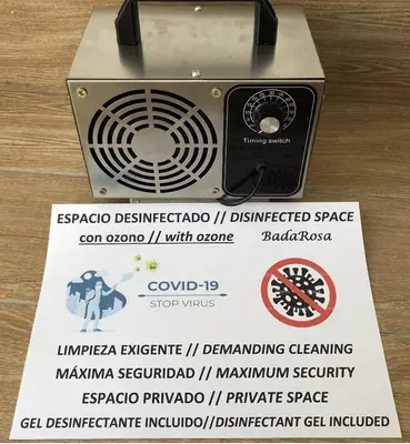 a box with a sign next to a fan at BADAROSA House10min to BARCELONA City&NearTo BEACH in Badalona
