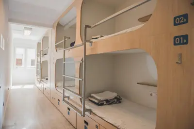 a group of bunk beds in a room at Rocket Hostels Gracia in Barcelona