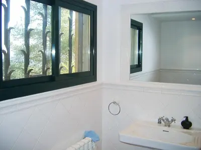 a bathroom with a sink and a mirror at CAN MAGINET in Avinyonet
