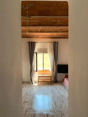 an open doorway to a room with a window at BlauMasnou One step to the beach! in Masnou