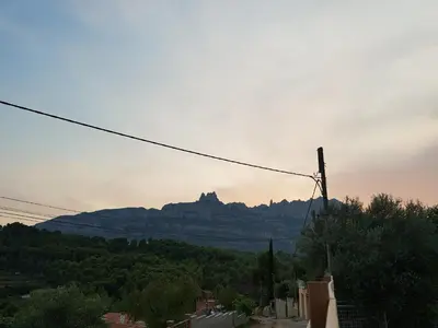 a view of a mountain in the distance at Apartament Vall de Montserrat in Castellbell i Vilar