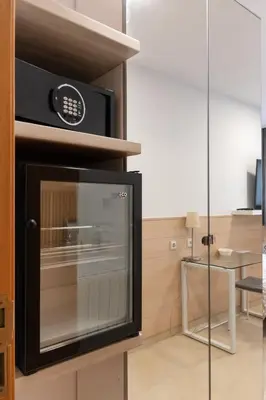 a microwave oven sitting inside of a kitchen at Hostal House in Barcelona