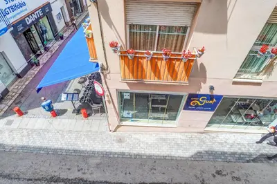 an overhead view of a building with a balcony at Aire Apartment by Hello Homes Sitges in Sitges