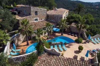 an aerial view of a villa with a swimming pool at Casa Jasmin at Masia Nur Sitges, Adults only in Canyelles