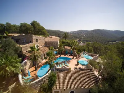 an aerial view of a resort with a swimming pool at Casa Jasmin at Masia Nur Sitges, Adults only in Canyelles