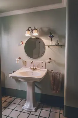 a bathroom with a sink and a mirror at Casa Baulenas in Caldes d'Estrac