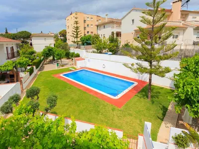 an aerial view of a yard with a swimming pool at Holiday Home Katy by Interhome in Cunit