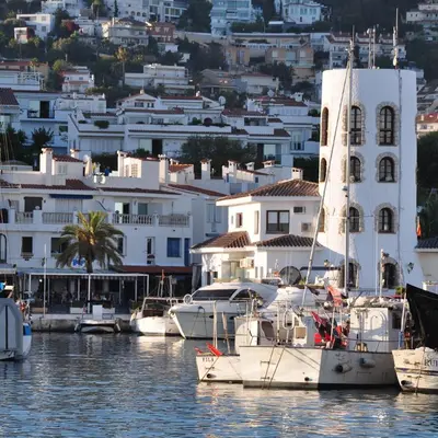 a group of boats docked in a harbor with buildings at APARTAMENTO MARINERO, Vistas impresionantes. in Sitges