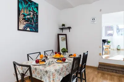 a dining room table with fruit on it at Key Sagrada Familia / MARINA 223 in Barcelona