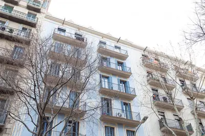 a tall building with balconies on the side of it at Key Sagrada Familia / MARINA 223 in Barcelona