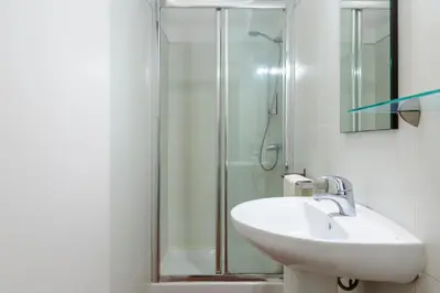 a bathroom with a sink and a shower at Monrooms Barcelona in Barcelona
