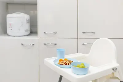 a bowl of fruit on a sink in a kitchen at Large & beautiful apartment 4min from Passeig de Gràcia in Barcelona