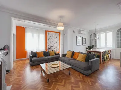 a living room with a couch and a table at Stay U-nique Apartments Roger Llúria in Barcelona