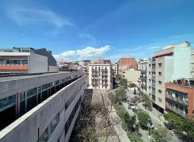 a view of a city from a building at Stay U-nique Apartments Degà Bahí in Barcelona
