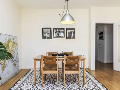 a dining room with a table and chairs at Apartment Vila Olimpica Sant Marti by Interhome in Barcelona
