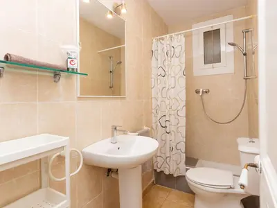a bathroom with a sink and a toilet and a shower at Apartment Gracia Torrijos by Interhome in Barcelona