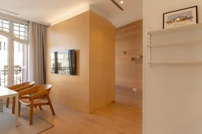 a living room with a couch and a table at Gòtic by The 5ve Soul in Barcelona