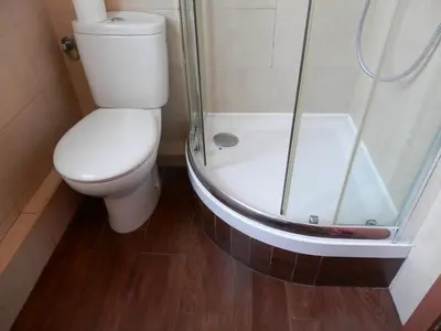 a bathroom with a toilet and a shower at Barcelona Central Garden Hostal in Barcelona