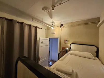 a bedroom with a bed in a room at Wow Hostel Barcelona in Barcelona
