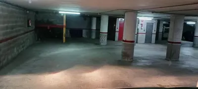 an empty parking garage with pillars in a parking lot at ESPIGALL in Vilanova i la Geltrú